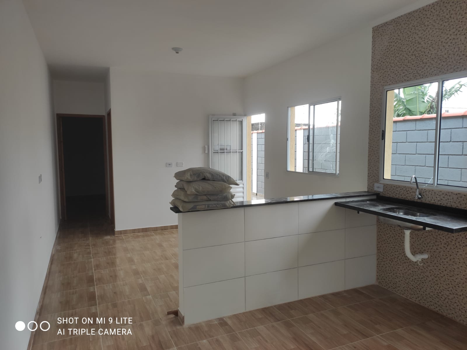 CASA NO BAIRRO NOVA ITANHAÉM - LADO MORRO A 1800 METROS DA PISTA - ITANHAÉM/SP - foto 11